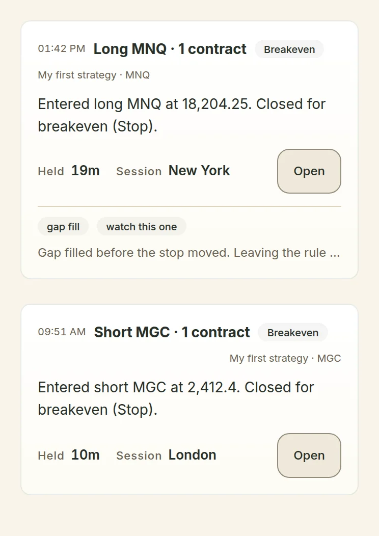 The Wildflower app on a phone, showing the Activity page: two entries written by the engine, one on MNQ and one on MGC. Each gives the time it closed, the strategy that took the trade, a sentence describing the trade in plain words, how long it was held and which session it ran in. The first also carries the customer's own two tags and their own note.